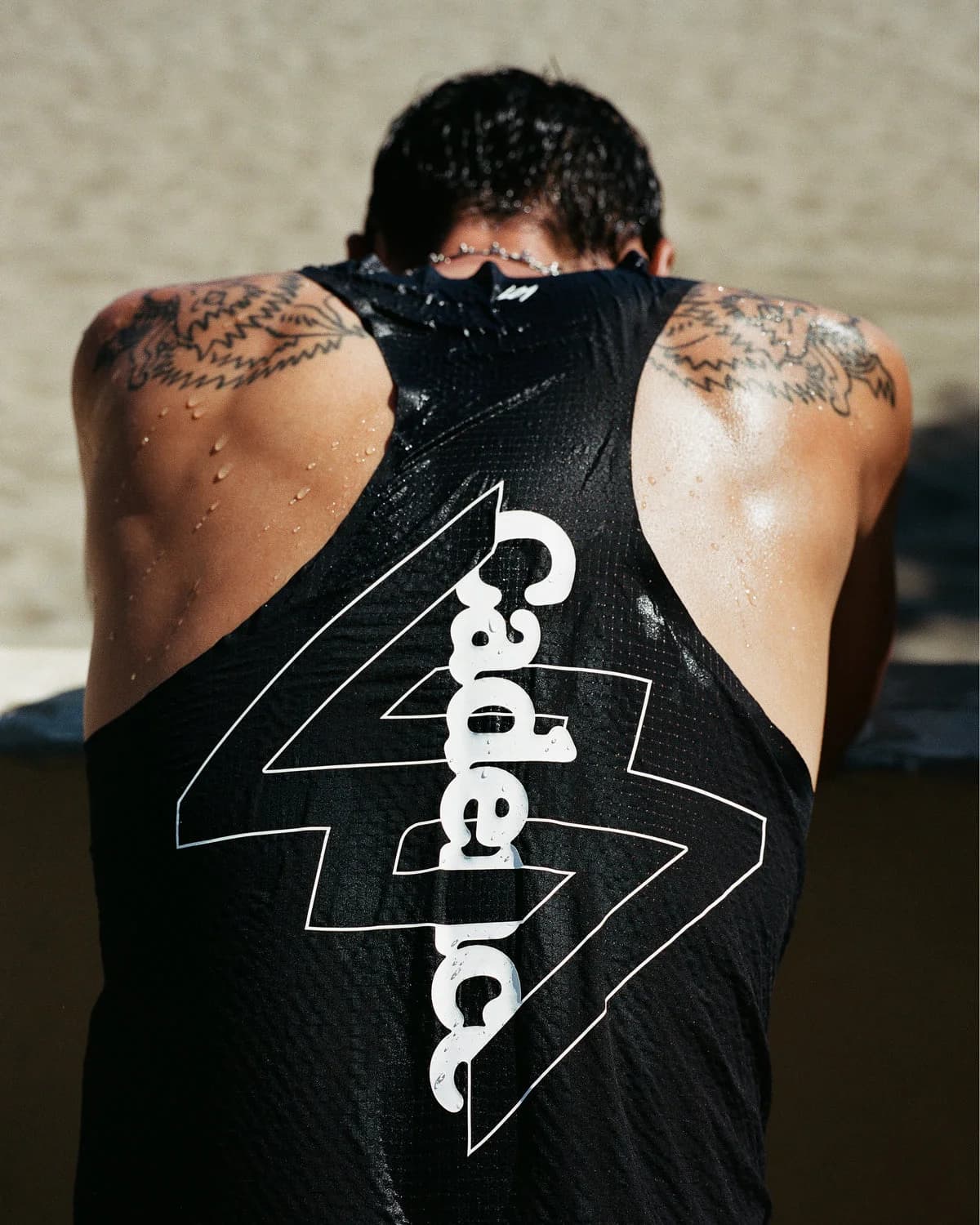 Back of a Cadence x 247 running singlet