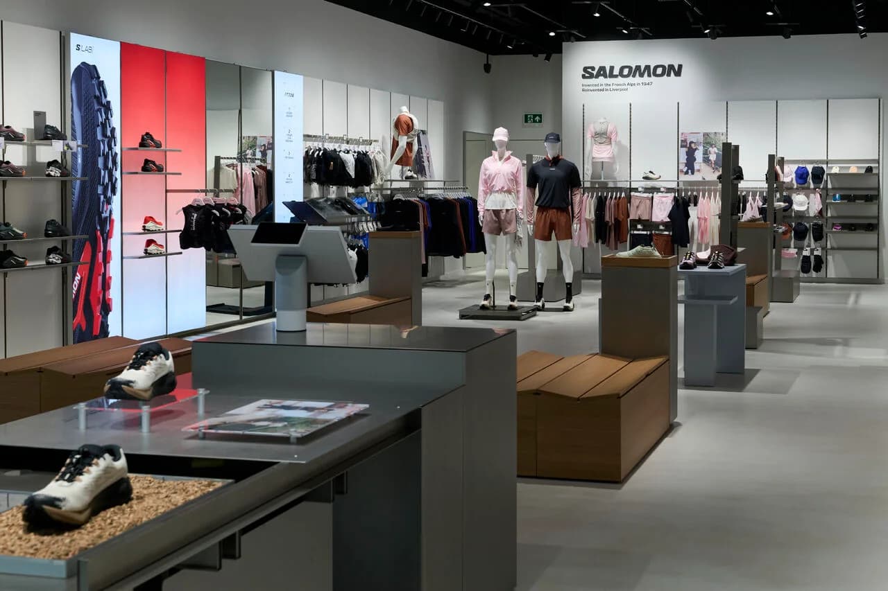 Salomon Liverpool store interior with footwear apparel and mannequins