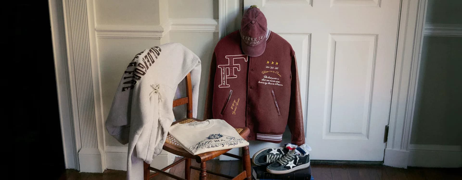 Golden Goose and FiveFourFive collegiate collection display