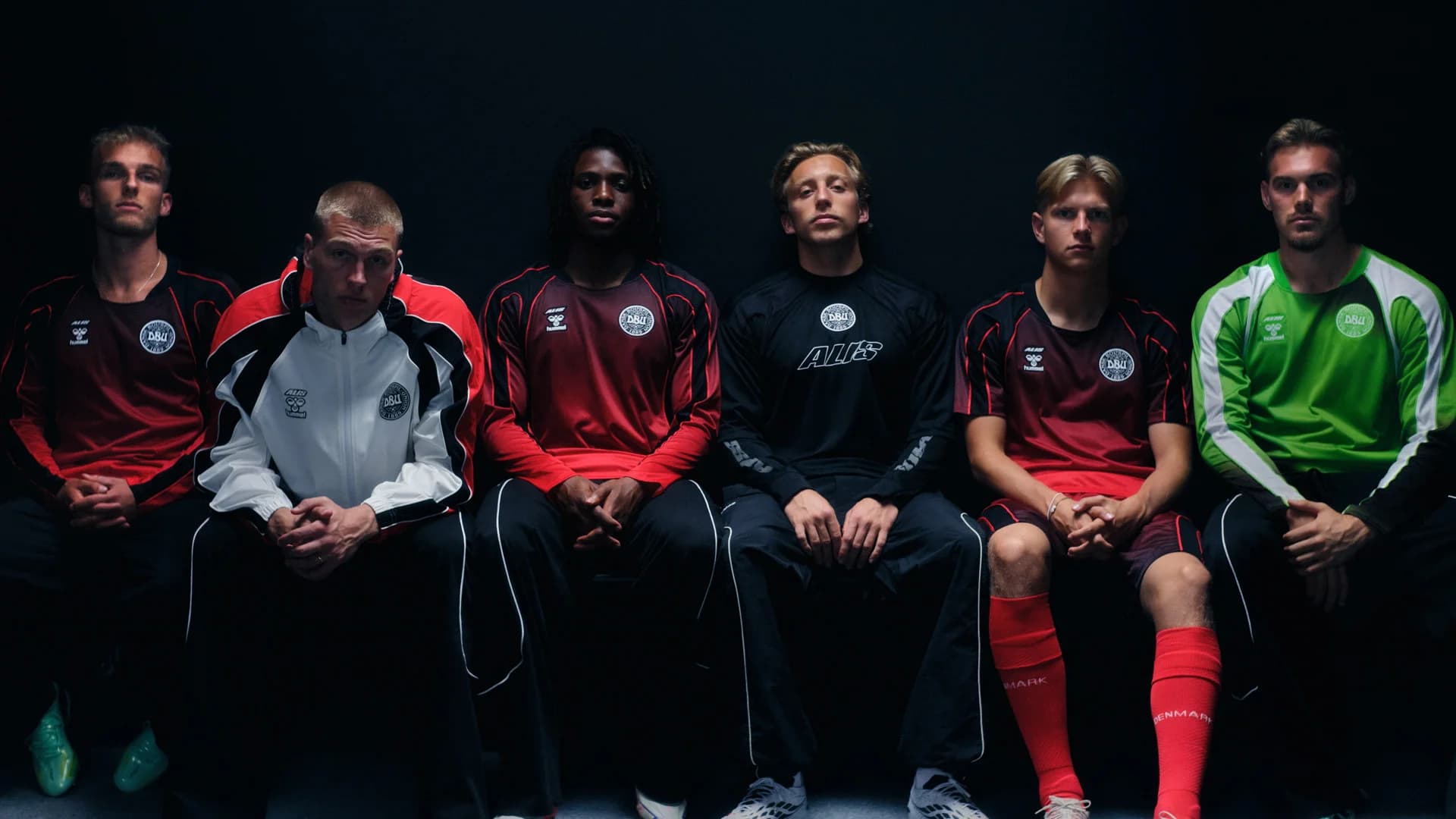 Danish national-team players wear red and black ALIS and hummel kits from Echoes of Denmark.