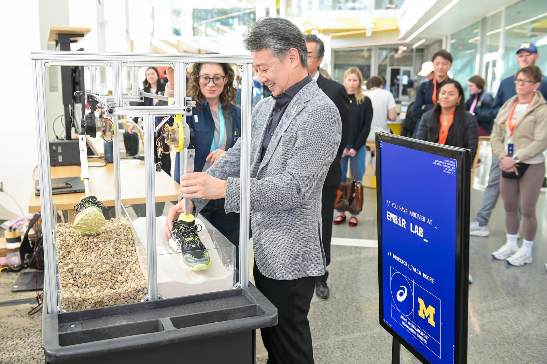 ASICS President and COO Mitsuyuki Tominaga at a footwear-testing demonstration in the Michigan lab