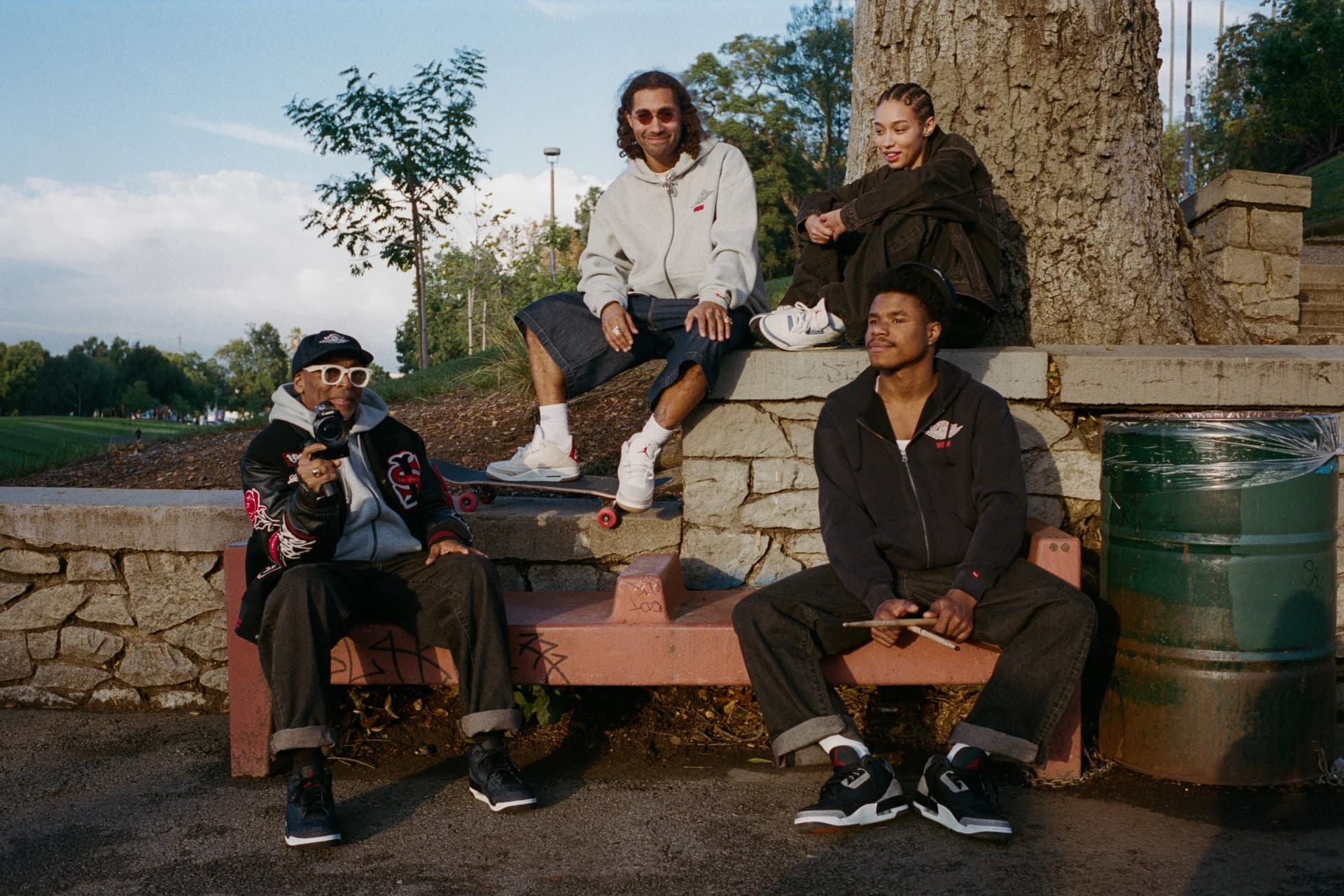 Spike Lee and the Jordan Brand x Levi’s campaign cast wear denim and Air Jordan 3 sneakers outdoors.