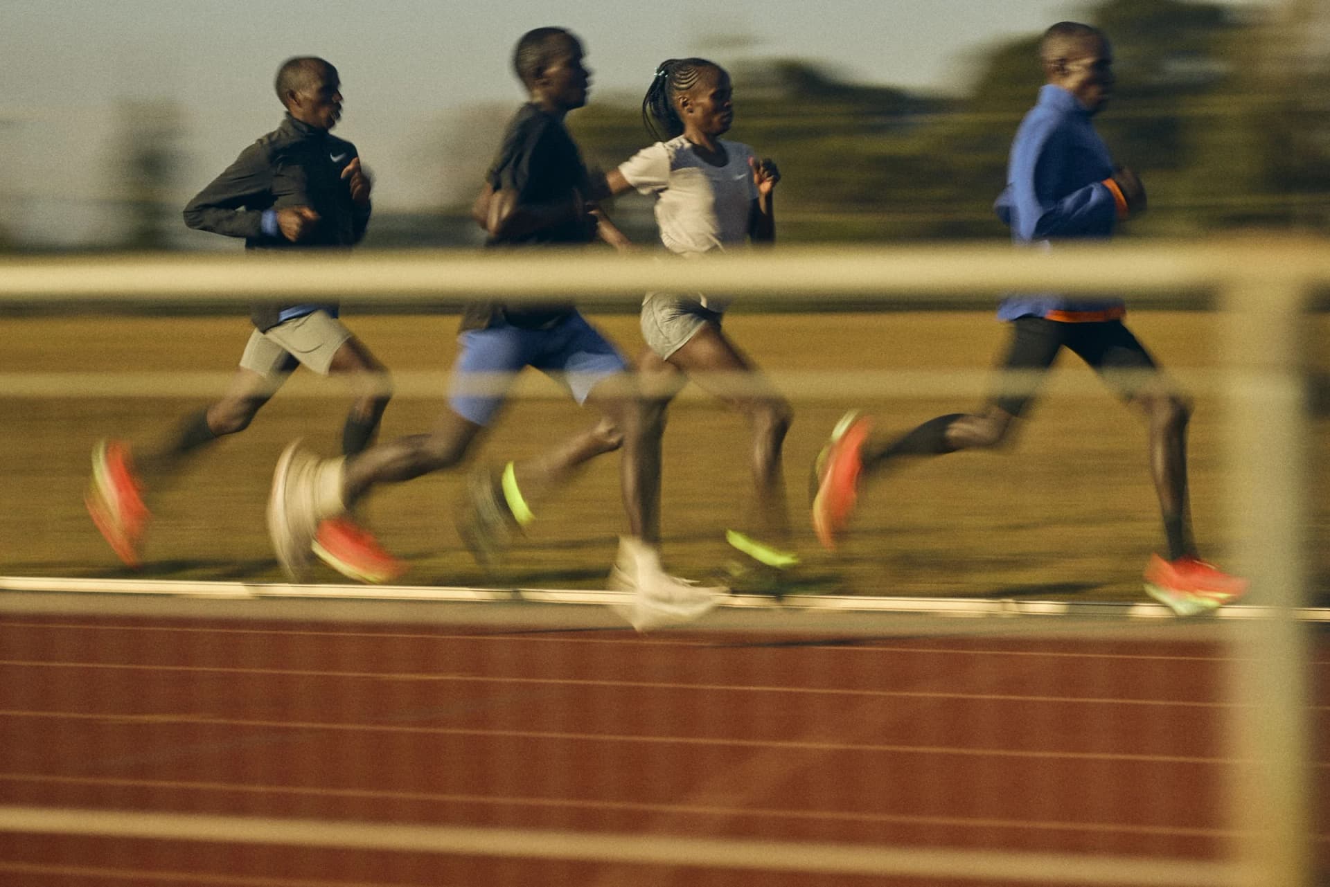 Elite runners testing Nike racing shoes on a track in Kenya