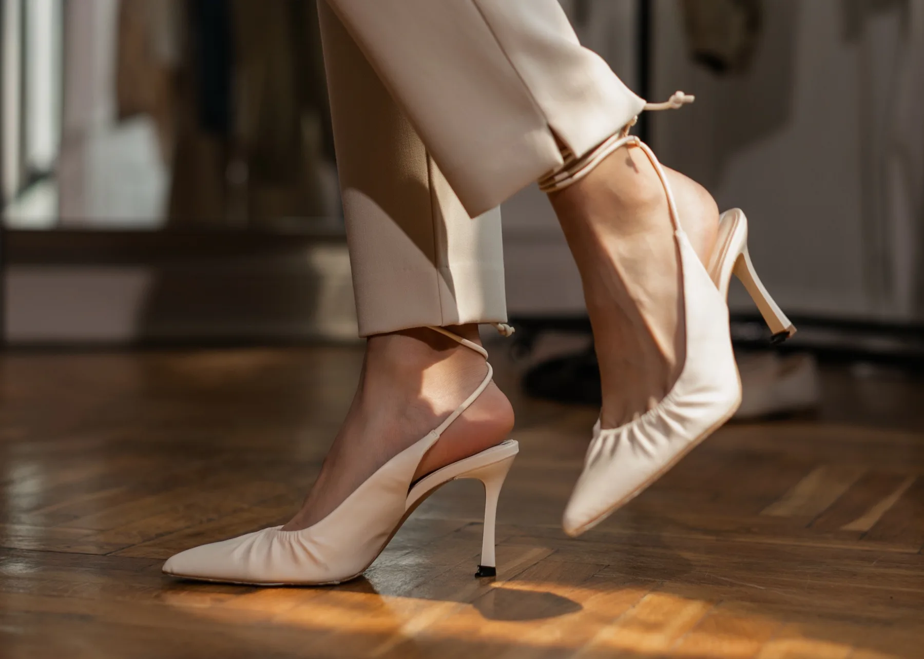 How many women wear high heels daily?