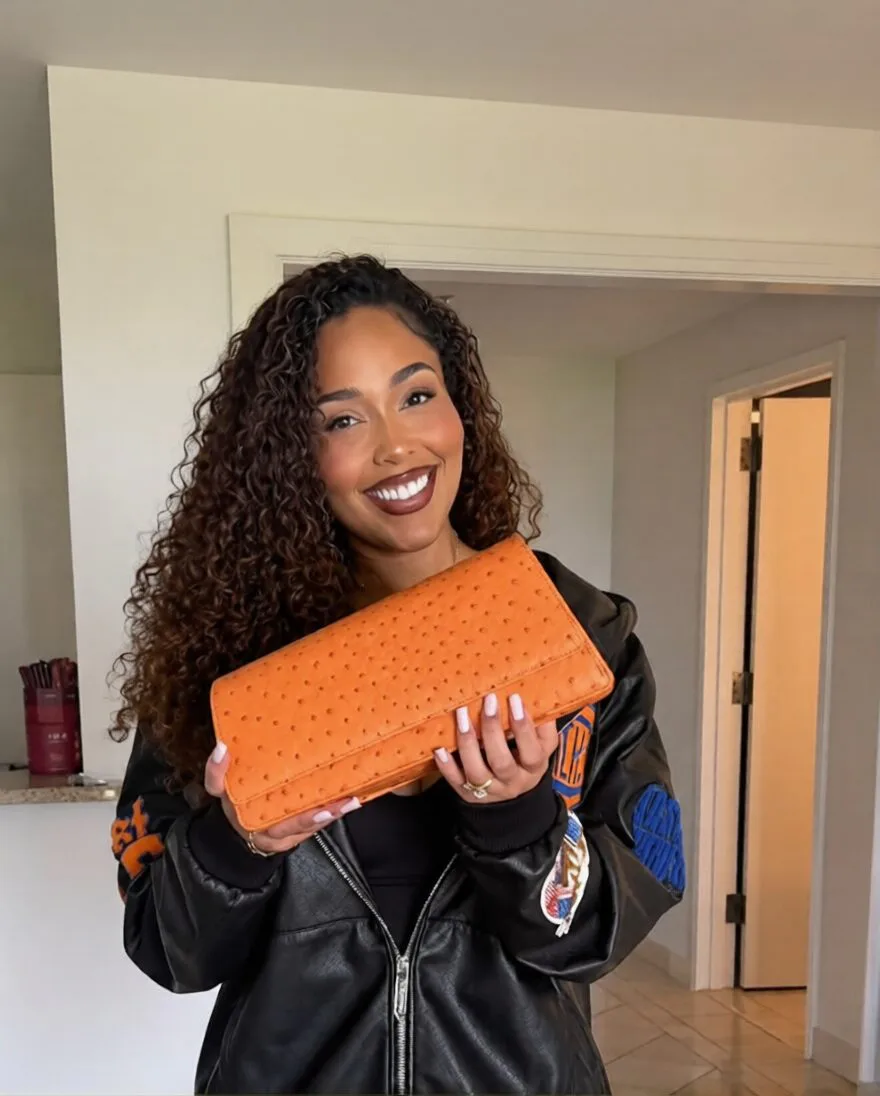 Jordyn Woods’ Orange Bag Becomes the NBA Finals’ Lucky Fashion Icon — additional view 1