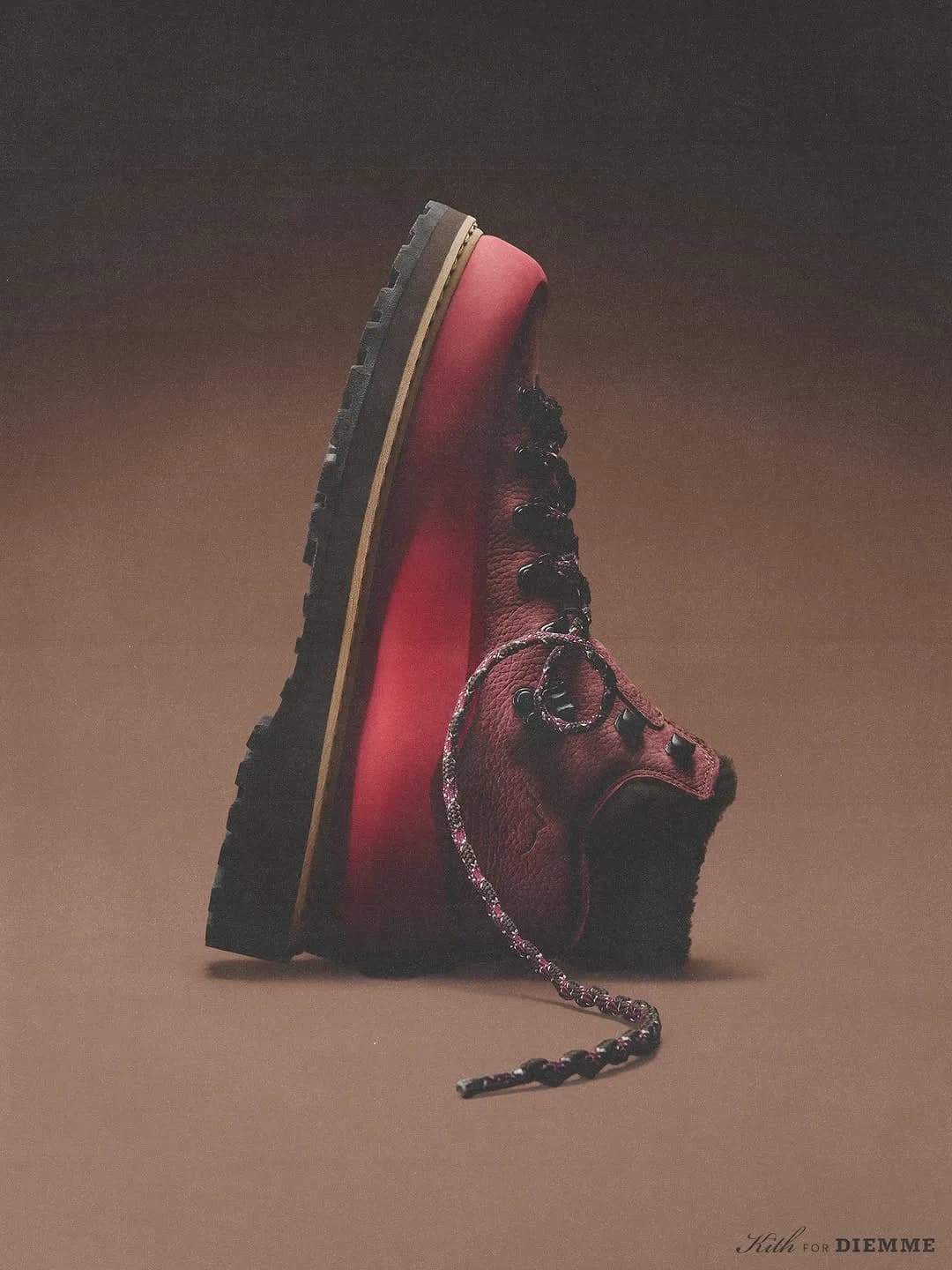 Side view of a burgundy Kith x Diemme hiking boot with loose laces