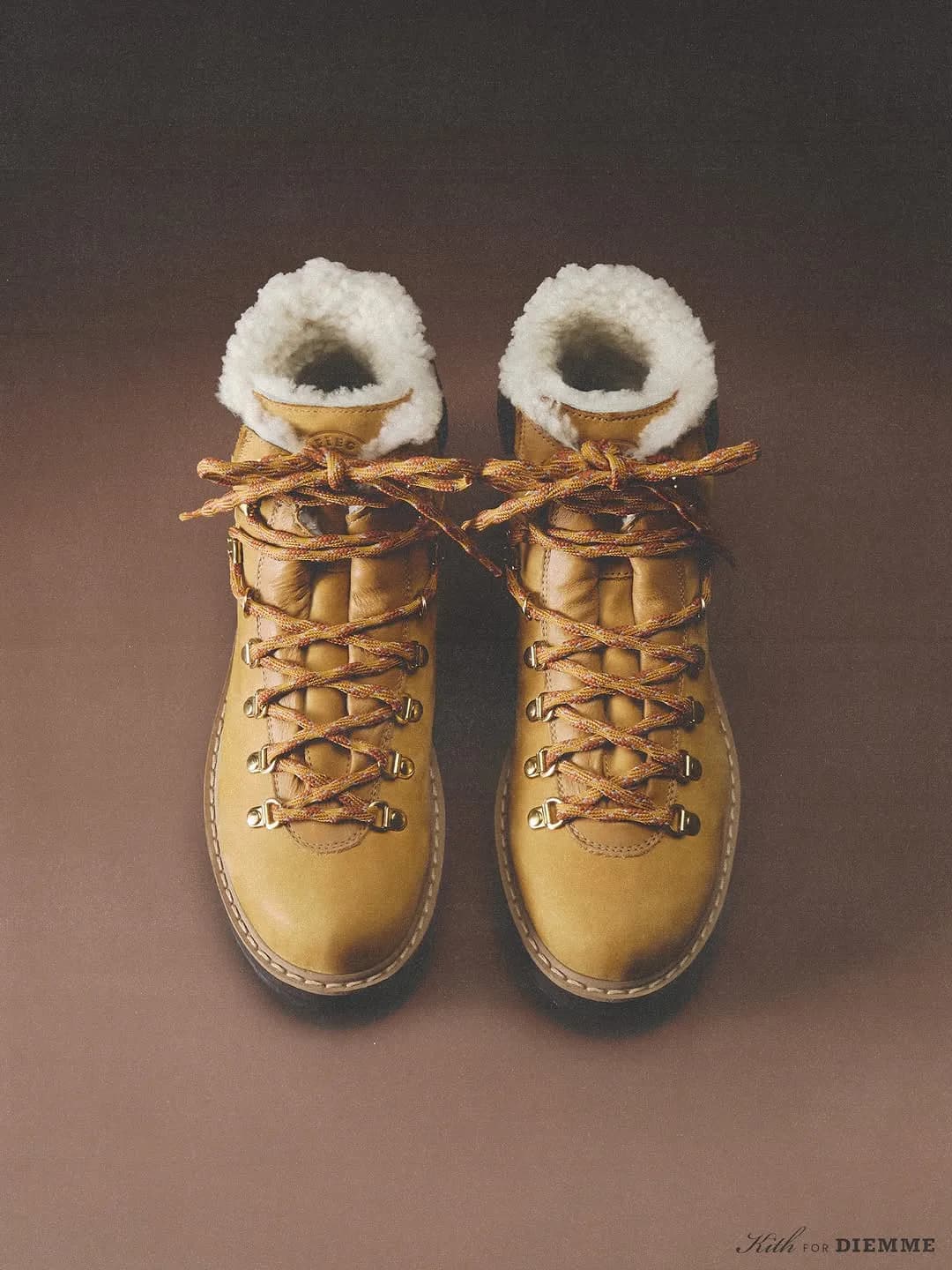 Pair of tan shearling-lined Kith x Diemme hiking boots