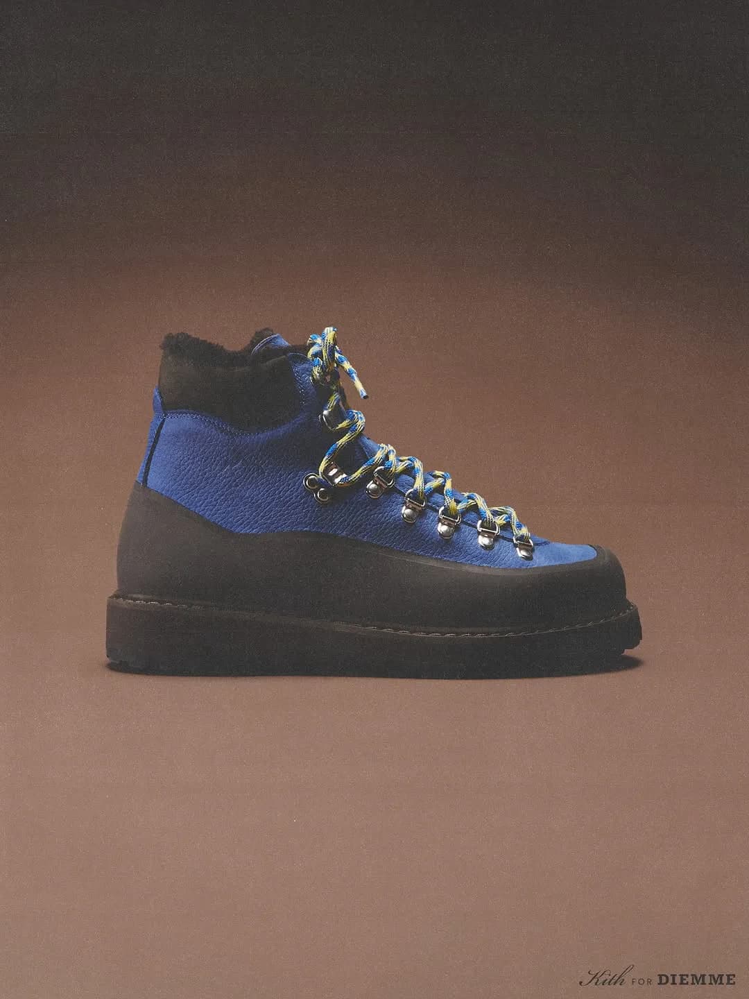 Side profile of a blue and black Kith x Diemme Roccia Vet Gomma boot