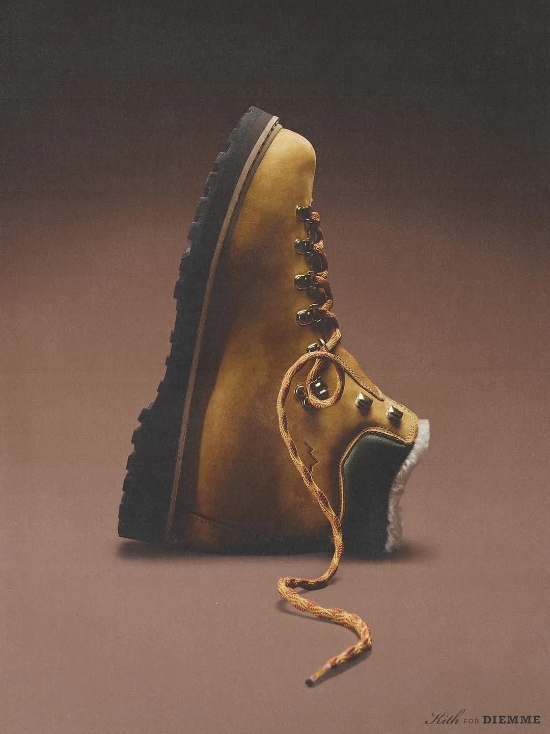 Side view of a tan Kith x Diemme hiking boot with loose laces