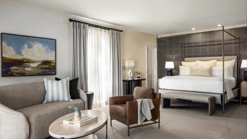 Peter Millar Suite bedroom and sitting area at an Omni resort