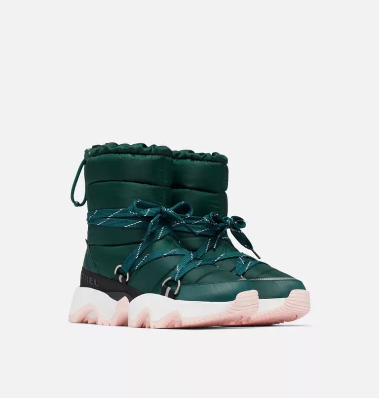 Pair of dark teal Sorel Kinetic Impact NXT puffer boots with pink soles